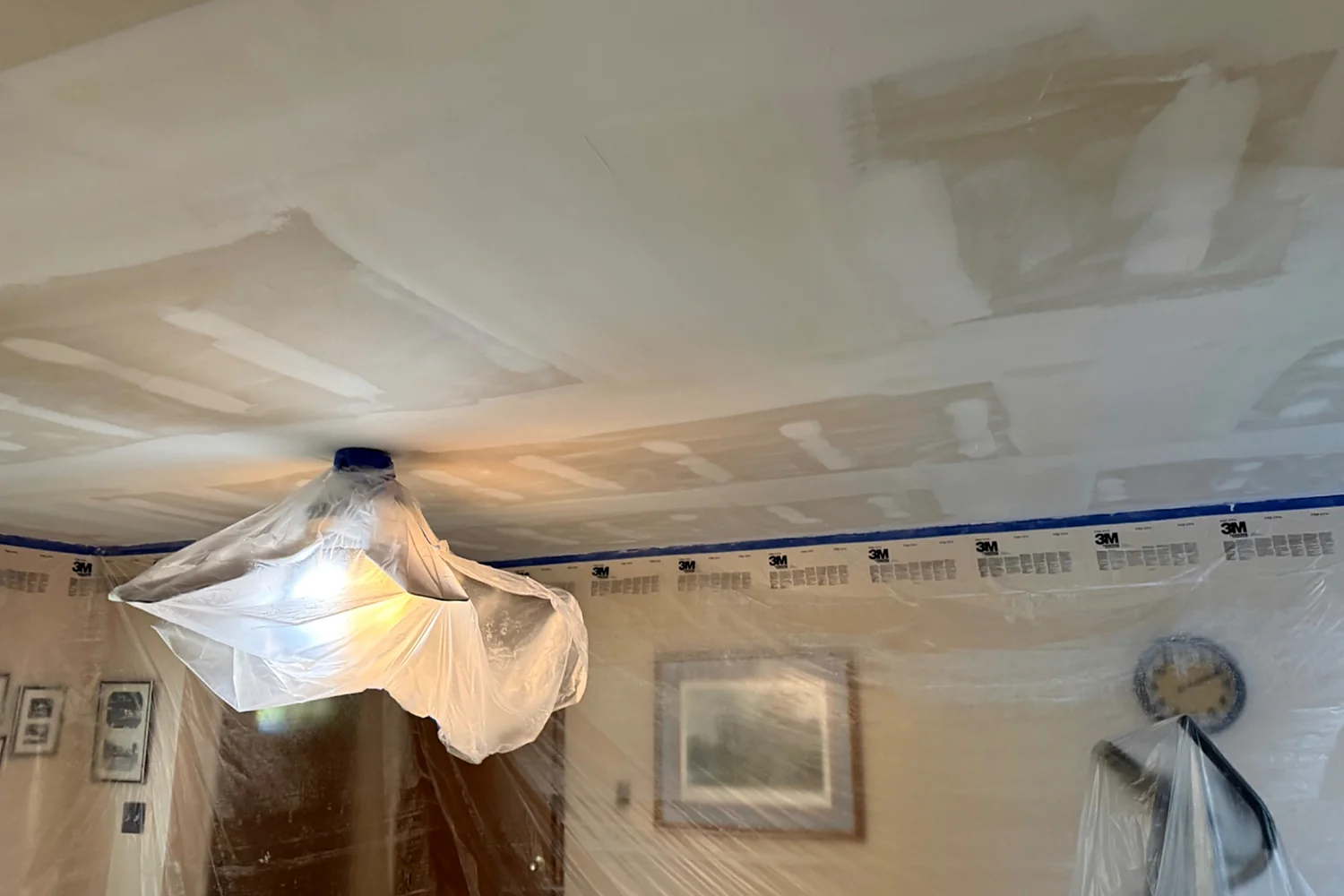 Ceiling repair area prepared for clean drywall finishing